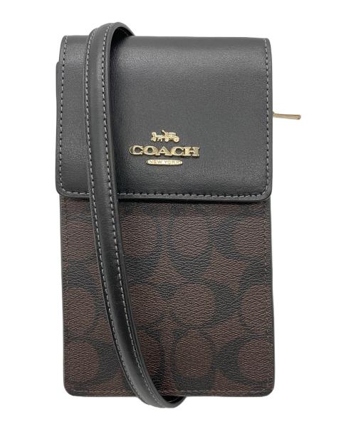 COACH（コーチ）COACH (コーチ) ノース／サウス フォーン クロスボディ・シグネチャー キャンバス ダークブラウン 未使用品の古着・服飾アイテム