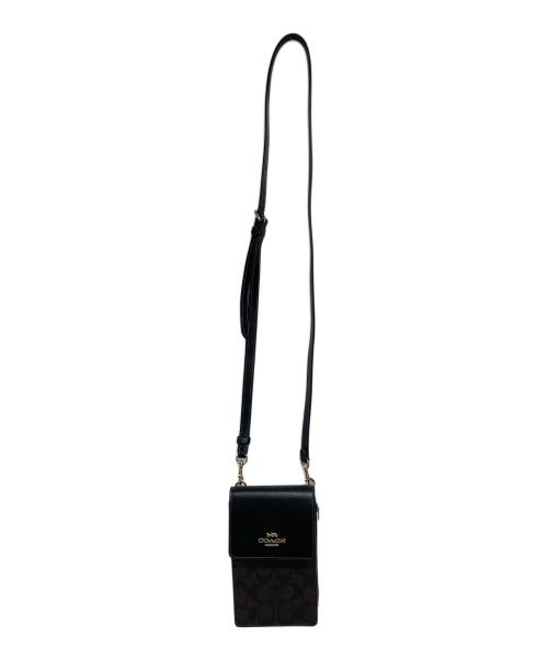 COACH（コーチ）COACH (コーチ) ノース／サウス フォーン クロスボディ・シグネチャー キャンバス ダークブラウン 未使用品の古着・服飾アイテム
