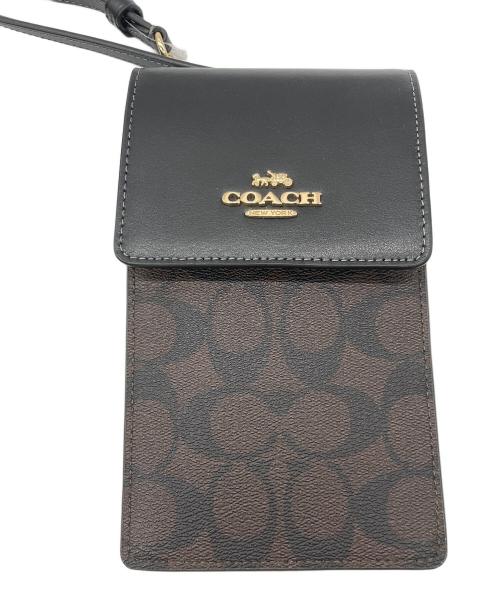 COACH（コーチ）COACH (コーチ) ノース／サウス フォーン クロスボディ・シグネチャー キャンバス ダークブラウン 未使用品の古着・服飾アイテム