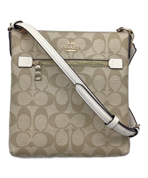 COACH（コーチ）COACH (コーチ) ミニ ローアン ファイル バッグ・シグネチャー キャンバス ベージュの古着・服飾アイテム