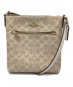 COACHコーチ）の古着「ミニ ローアン ファイル バッグ・シグネチャー キャンバス」｜ベージュ