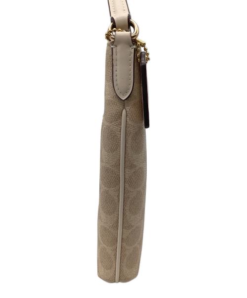 COACH（コーチ）COACH (コーチ) ミニ ローアン ファイル バッグ・シグネチャー キャンバス ベージュの古着・服飾アイテム