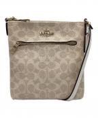 COACHコーチ）の古着「ミニ ローアン ファイル バッグ・シグネチャー キャンバス」｜ベージュ