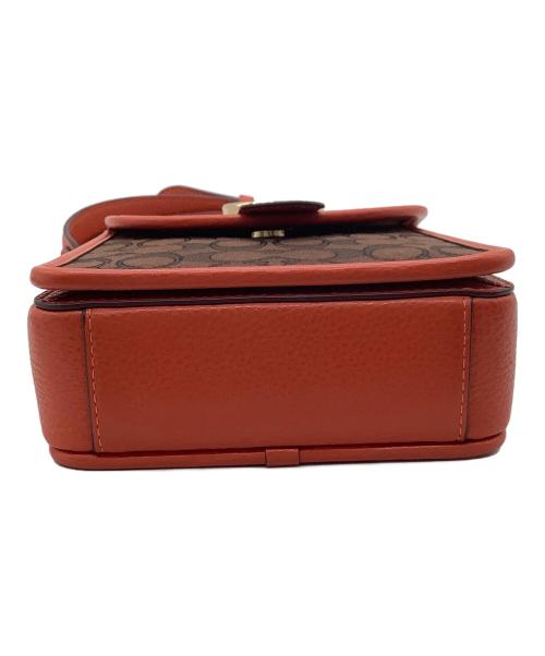 COACH（コーチ）COACH (コーチ) ノース／サウス ロニー クロスボディ シグネチャー ジャカード ブラウン×オレンジ 未使用品の古着・服飾アイテム