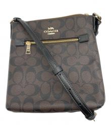 COACH（コーチ）の古着「ミニ ローアン ファイル バッグ・シグネチャー キャンバス」｜ブラウン