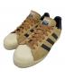 adidas（アディダス）の古着「ローカットスニーカー」｜オレンジ
