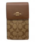 COACHコーチ）の古着「ノース／サウス フォーン クロスボディ・シグネチャー キャンバス」
