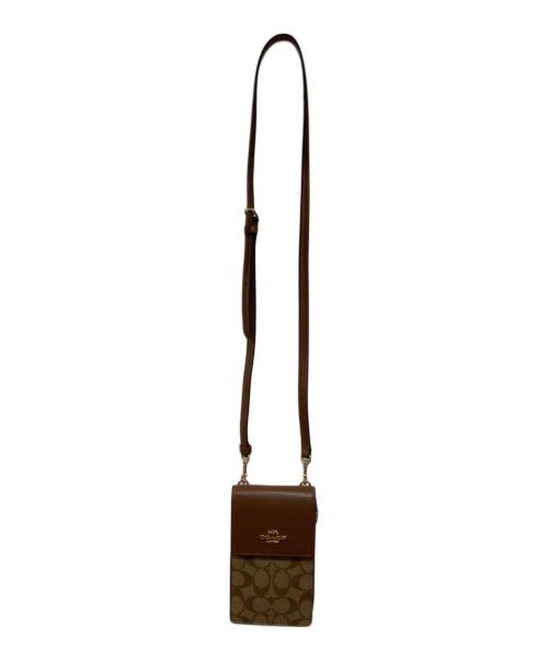COACH（コーチ）COACH (コーチ) ノース／サウス フォーン クロスボディ・シグネチャー キャンバス 未使用品の古着・服飾アイテム