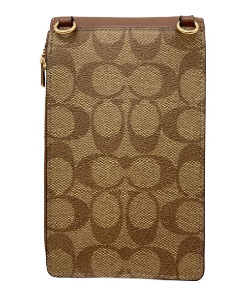 COACH（コーチ）COACH (コーチ) ノース／サウス フォーン クロスボディ・シグネチャー キャンバス 未使用品の古着・服飾アイテム