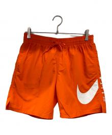 NIKE（ナイキ）の古着「水陸両用 グラフィック スペック 7 ボレーショーツ」｜オレンジ
