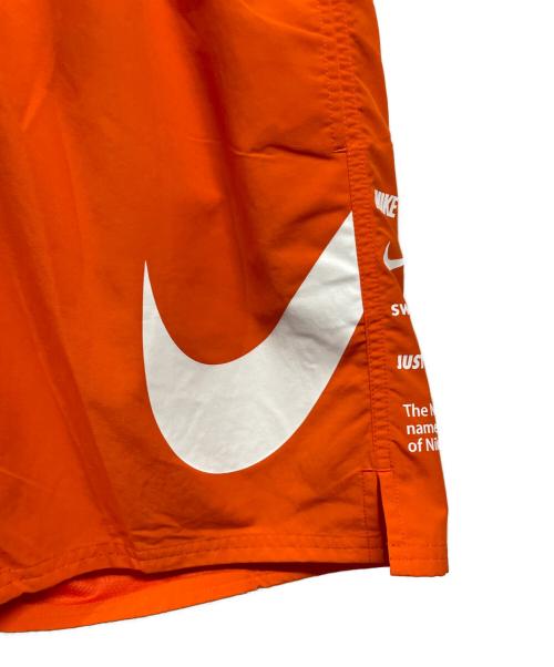 NIKE（ナイキ）NIKE (ナイキ) 水陸両用 グラフィック スペック 7 ボレーショーツ オレンジ サイズ:L 未使用品の古着・服飾アイテム