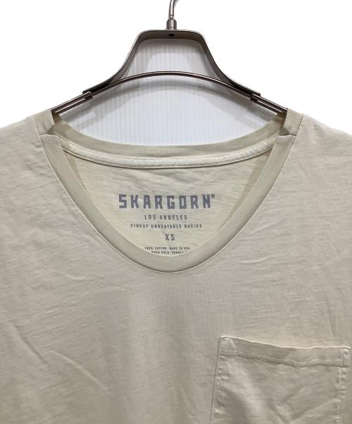 SKARGORN（スカルゴーン）SKARGORN (スカルゴーン) 半袖カットソー アイボリー サイズ:M 未使用品の古着・服飾アイテム