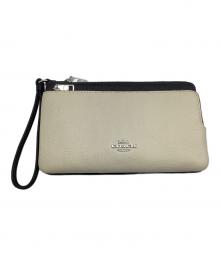 COACH（コーチ）の古着「ダブル ジップ リストレット」｜ベージュ×ブラック
