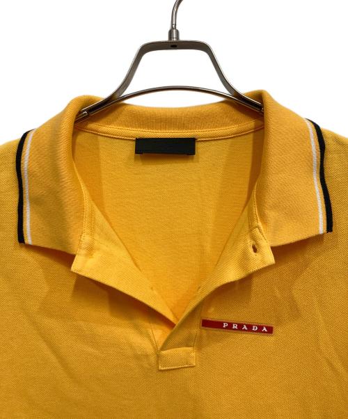 PRADA（プラダ）PRADA (プラダ) フロントラバー ラインポロシャツ オレンジ サイズ:XLの古着・服飾アイテム