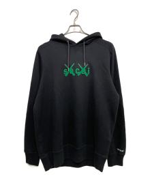 sacai×KAWS（サカイ×カウズ）の古着「Flock Print Hooide」｜ブラック