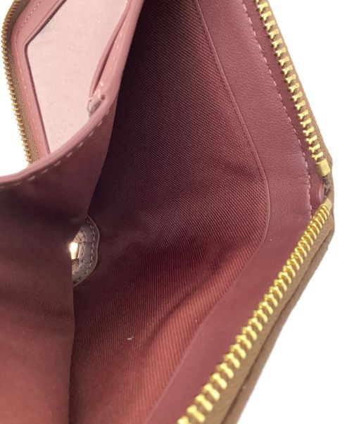 COACH（コーチ）COACH (コーチ) ラウンドファスナー2つ折り財布の古着・服飾アイテム