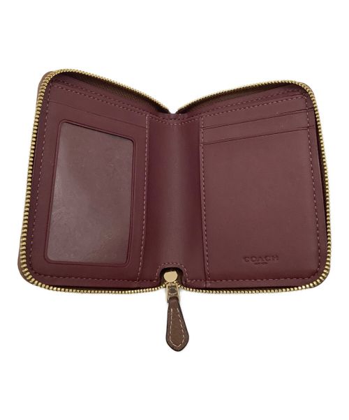 COACH（コーチ）COACH (コーチ) ラウンドファスナー2つ折り財布の古着・服飾アイテム