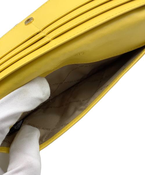 MICHAEL KORS（マイケル・コース）MICHAEL KORS (マイケルコース) ラージスナップ ウォレット イエローの古着・服飾アイテム