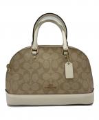 COACHコーチ）の古着「シグネチャー 2WAYバッグ」｜ベージュ×ホワイト