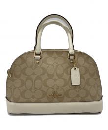 COACH（コーチ）の古着「シグネチャー 2WAYバッグ」｜ベージュ×ホワイト