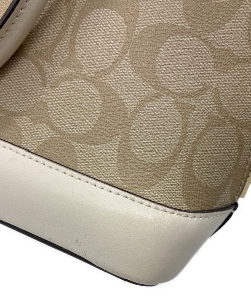 COACH（コーチ）COACH (コーチ) シグネチャー 2WAYバッグ ベージュ×ホワイトの古着・服飾アイテム