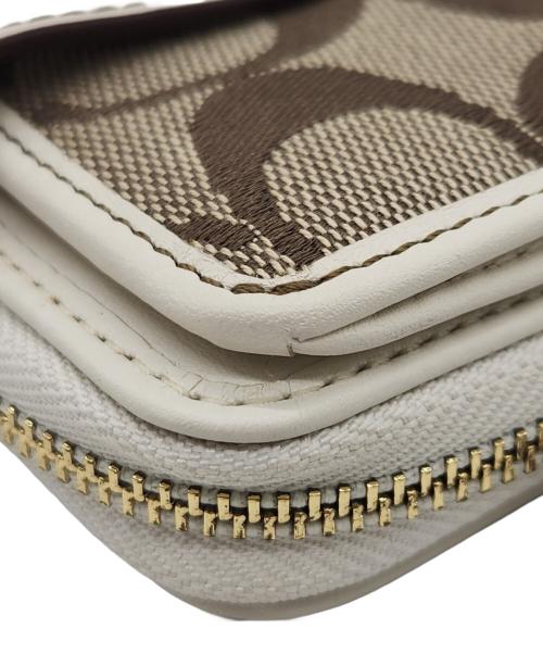 COACH（コーチ）COACH (コーチ) 2つ折り財布 ホワイト×ベージュの古着・服飾アイテム