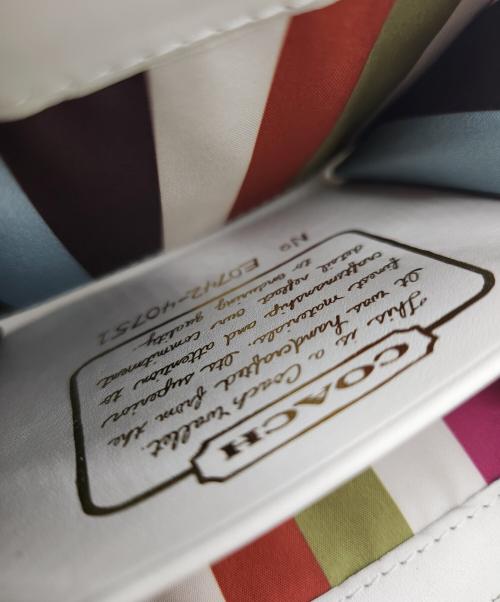 COACH（コーチ）COACH (コーチ) 2つ折り財布 ホワイト×ベージュの古着・服飾アイテム