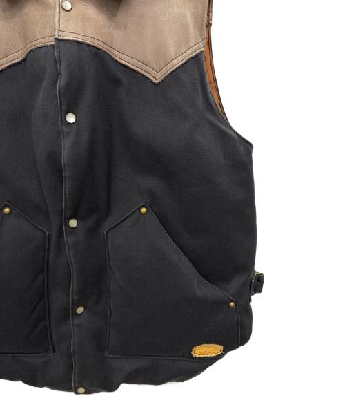 RockyMountainFeatherBed（ロッキーマウンテンフェザーベッド）RockyMountainFeatherBed (ロッキーマウンテンフェザーベッド) ダウンベスト ブラウン×ブラック サイズ:36の古着・服飾アイテム