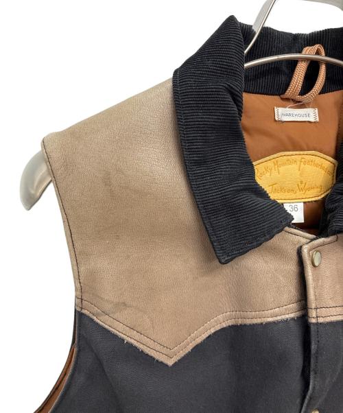 RockyMountainFeatherBed（ロッキーマウンテンフェザーベッド）RockyMountainFeatherBed (ロッキーマウンテンフェザーベッド) ダウンベスト ブラウン×ブラック サイズ:36の古着・服飾アイテム