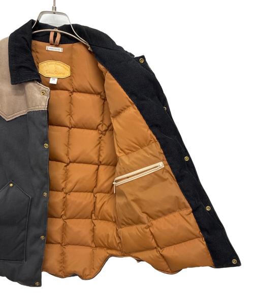 RockyMountainFeatherBed（ロッキーマウンテンフェザーベッド）RockyMountainFeatherBed (ロッキーマウンテンフェザーベッド) ダウンベスト ブラウン×ブラック サイズ:36の古着・服飾アイテム
