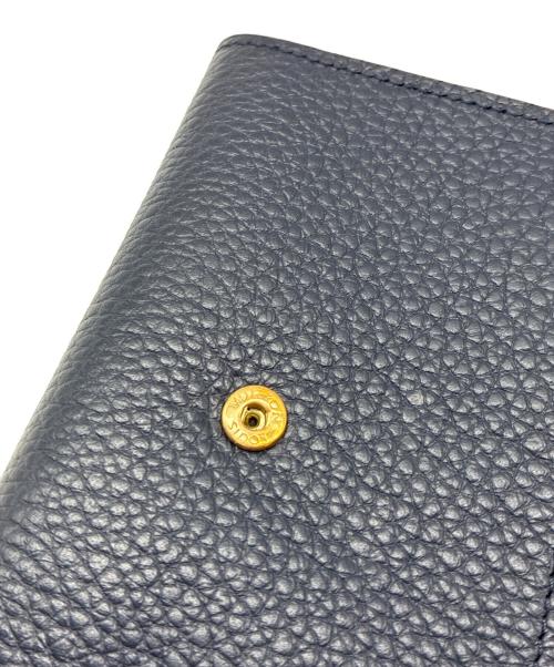 LOUIS VUITTON（ルイ ヴィトン）LOUIS VUITTON (ルイ ヴィトン) トリヨン ポルトフォイユ・カプシーヌコンパクト ネイビーの古着・服飾アイテム