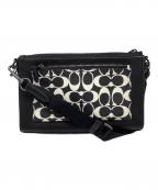 COACHコーチ）の古着「ホールデン クロスボディ シグネチャー・キャンバス」｜ブラック×ホワイト