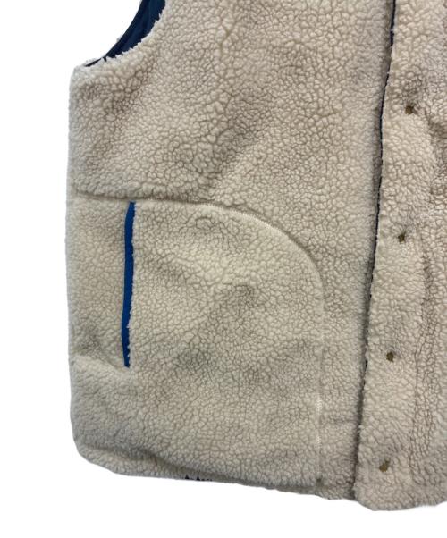 Patagonia（パタゴニア）Patagonia (パタゴニア) リバーシブル ビビー ダウンベスト ブルー×ベージュ サイズ:不明の古着・服飾アイテム