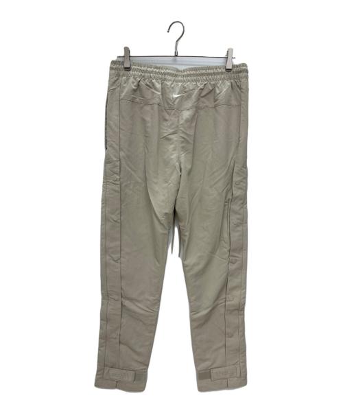 NIKE（ナイキ）NIKE (ナイキ) FEAR OF GOD (フィア・オブ・ゴッド) ウォームアップイージーパンツ ベージュ サイズ:Mの古着・服飾アイテム