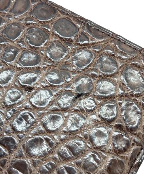 HERGOPOCH（エルゴポック）HERGOPOCH (エルゴポック) 型押し 2つ折り財布 ブラウンの古着・服飾アイテム