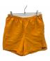 Patagonia（パタゴニア）の古着「バギーズショーツ」｜オレンジ