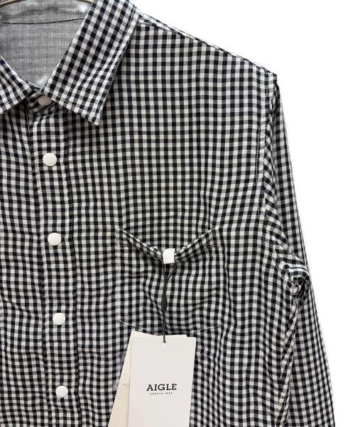 AIGLE（エーグル）AIGLE (エーグル) 長袖シャツ ホワイト×ブラック サイズ:M 未使用品の古着・服飾アイテム