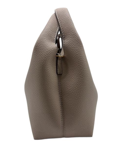 CHARLES & KEITH（チャールズアンドキース）CHARLES & KEITH (チャールズアンドキース) メタリックアクセントバケットバッグ ベージュの古着・服飾アイテム