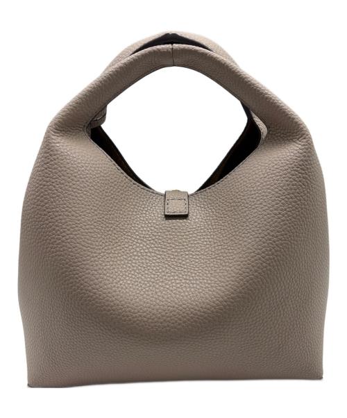 CHARLES & KEITH（チャールズアンドキース）CHARLES & KEITH (チャールズアンドキース) メタリックアクセントバケットバッグ ベージュの古着・服飾アイテム