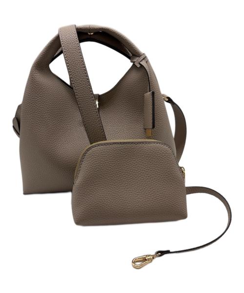 CHARLES & KEITH（チャールズアンドキース）CHARLES & KEITH (チャールズアンドキース) メタリックアクセントバケットバッグ ベージュの古着・服飾アイテム