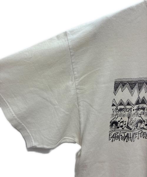 stussy（ステューシー）stussy (ステューシー) RASTA TOM TOM 半袖Tシャツ ホワイト×ブラック サイズ:Lの古着・服飾アイテム