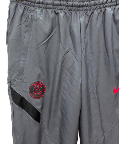 NIKE（ナイキ）NIKE (ナイキ) PARIS SAINT-GERMAIN (パリサンジェルマン) セットアップジャージ グレー×レッド サイズ:S 未使用品の古着・服飾アイテム