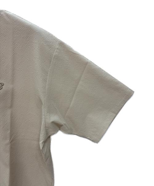 NEW BALANCE（ニューバランス）NEW BALANCE (ニューバランス) シアサッカーポロシャツ ベージュ サイズ:Lの古着・服飾アイテム