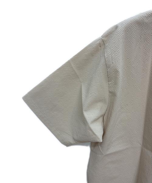NEW BALANCE（ニューバランス）NEW BALANCE (ニューバランス) シアサッカーポロシャツ ベージュ サイズ:Lの古着・服飾アイテム