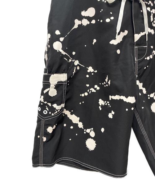 stussy（ステューシー）stussy (ステューシー) ペイントサーフパンツ ブラック×ホワイト サイズ:36の古着・服飾アイテム