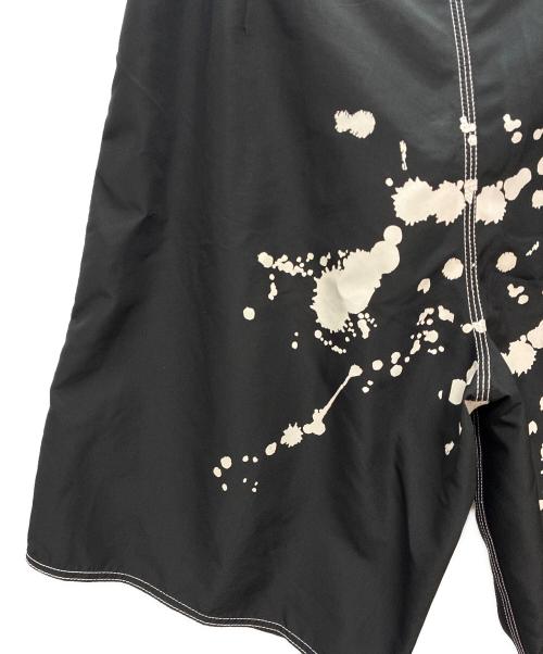 stussy（ステューシー）stussy (ステューシー) ペイントサーフパンツ ブラック×ホワイト サイズ:36の古着・服飾アイテム