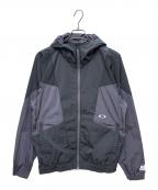 OAKLEYオークリー）の古着「ENHANCE UB RIPSTOP WIND JACKET 12.7」｜グレー×ネイビー