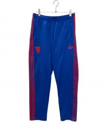 adidas Originals（アディダスオリジナル）の古着「マンチェスター・ユナイテッド オリジナルス トラックパンツ」｜ブルー×レッド