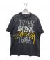 stussy（ステューシー）の古着「00s INTERNATIONAL TRIBE 半袖Tシャツ」｜ブラック