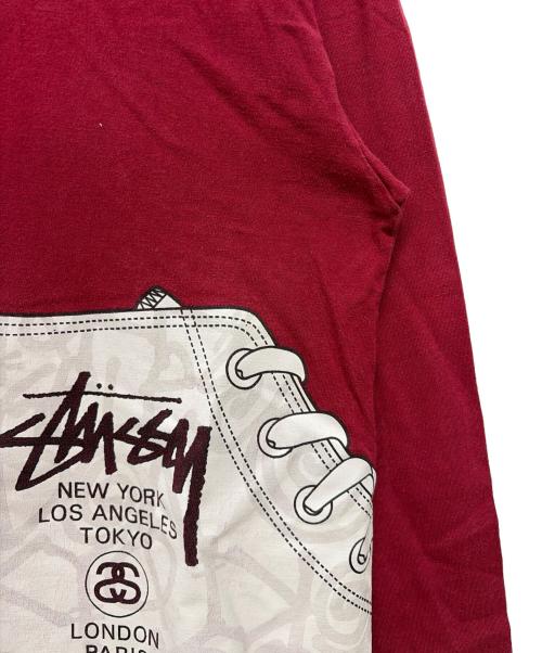 stussy（ステューシー）stussy (ステューシー) 00s スニーカープリント 長袖カットソー レッド サイズ:SIZE Lの古着・服飾アイテム